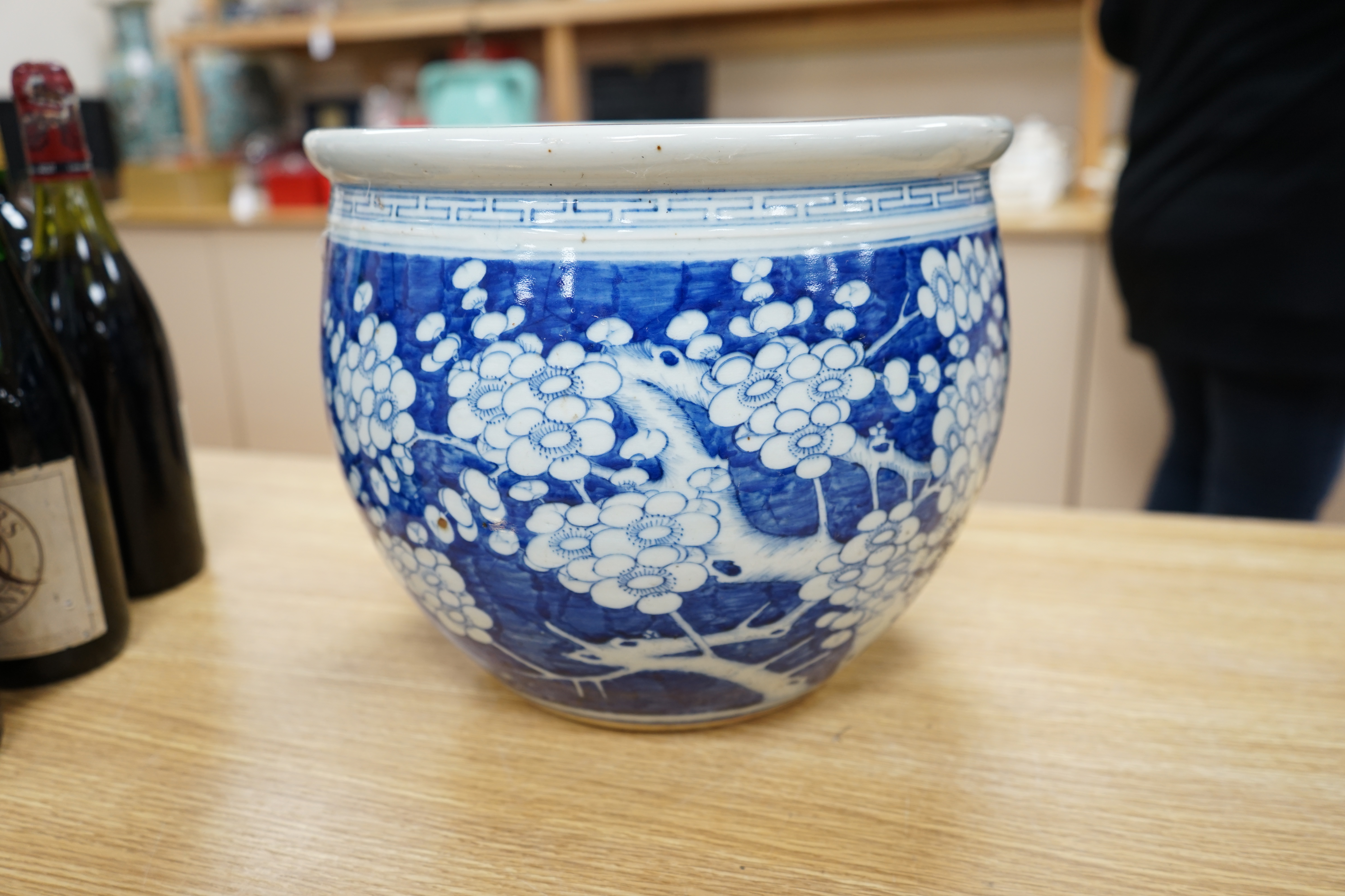 A large Chinese blue and white prunus flower planter, 32cm in diameter. Condition - fair to good